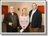 Pictured at the official opening of an exhibition of paintings by Gavin Hogg in the Linenhall Art Centre Castlebar, from left: Gavin Hogg artist; Marie Farrell, director Linenhall Art Centre and Eamonn Smith, chairman Linenhall Art Centre. Photo Michael Donnelly