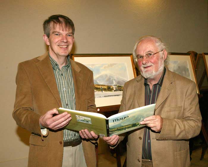 Artist John McHugh and book author Michael Mullen pictured at the launch of Michaels book "Mayo"  in the Linenhall Arts Centre, Castlebar. Photo: Michael Donnelly