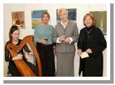 Pictured in the Linenhall Arts Centre, Castlebar at the launch of  the book Mayo, the Waters and the Wild writen by Michael Mullen with paintings by John P McHugh from left:  Sinead Healy Westport Rd Castlebar who provided the background music; Anna Staunton  Angela Irwin, and Rowena Kilkelly, Castlebar. Photo: Michael Donnelly

