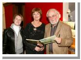 Deirdre and Michael Mullen, pictured in the Linenhall Arts Centre, Castlebar at the launch of   Michaels book Mayo, the Waters and the Wild with paintings by John P McHugh  pictured with their niece Aisling McLoughlin Photo: Michael Donnelly