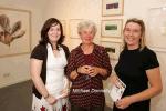 Marianne Heemskerk, Artist  (centre) pictured with her paintings in background at the official opening of an Exhibition from the Original Prints Gallery, (Temple Bar Dublin) in the Linenhall Arts Centre Castlebar, Included in photo are Crna Connolly Director Original Prints Gallery, (on left) and Marie Farrell, director Linenhall Arts Centre. Photo Michael Donnelly