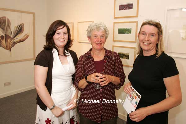 Marianne Heemskerk, Artist  (centre) pictured with her paintings in background at the official opening of an Exhibition from the Original Prints Gallery, (Temple Bar Dublin) in the Linenhall Arts Centre Castlebar, Included in photo are Crna Connolly Director Original Prints Gallery, (on left) and Marie Farrell, director Linenhall Arts Centre. Photo Michael Donnelly