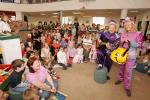 Cilla & Artie from the Singing Kettle's Theatre Company exciting show Blast Off, which takes place in the TF Royal Theatre, Castlebar on Thursday 25th August pictured as they go through their Routine in the County Library Castlebar with a group of children and parents. Photo: Michael Donnelly.