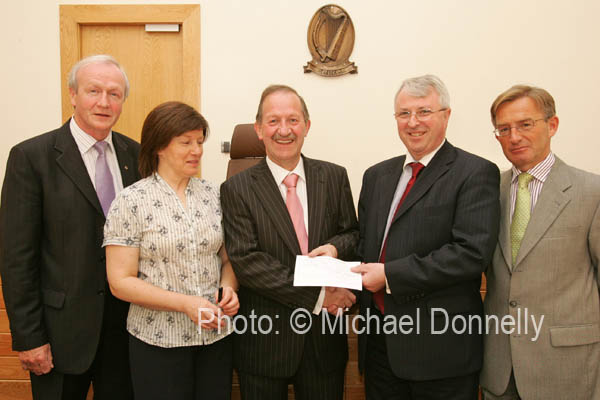 Fianna Fail General Election candidate for Mayo, Deputy John Carty, T.D., (centre) hands in his nomination paper to Returning Officer Fintan Murphy, in the Court House Castlebar, included in photo from left: Denis Gallagher, Director of Elections; Marie Quinn, Assistant Returning Officer; and Aidan Crowley, Election Agent. Photo:  Michael Donnelly
