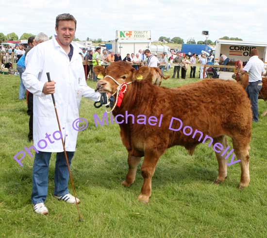 Liam Lavelle Belmullet, pictured with his prizewinning  Young Bull Calf (Limousin) at Roundfort Agricultural Show. Photo Michael Donnelly