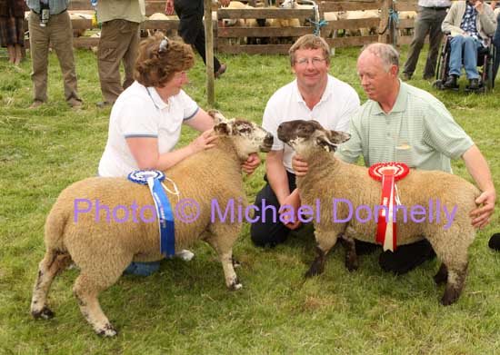 Aidan Fahy, Ardrahan Co Galway, (on right) pictured with his Champion and Reserve Champion Commercial Sheep at Roundfort Agricultural Show, included in phopto are Margaret Niland and John Donaghue (Sheep Judge). Photo:  Michael Donnelly