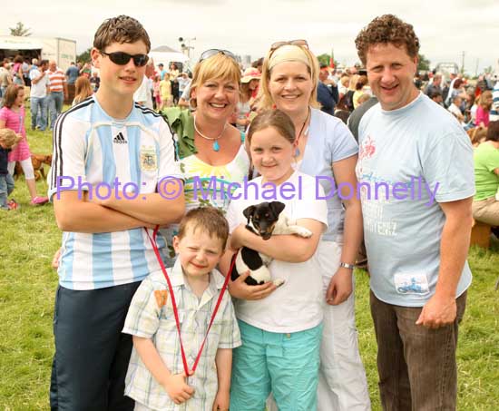 Pictured as they await a class at Roundfort Agricultural Show, from left: Alex Lowry, Karen Lowry, Mairead Coleman and Seamus Byrne; at front are Mark Byrne and Rebecca Byrne holding a minature Jack Russell. Photo:  Michael Donnelly