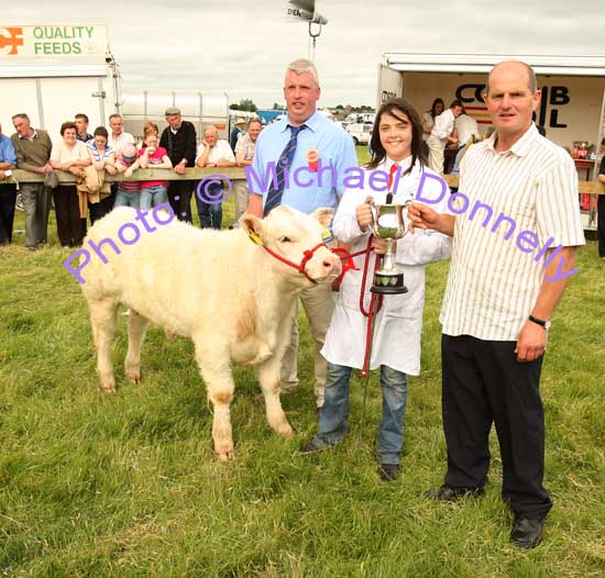 Jim Nally, Chairman Roundfort Agricultural Show presents the Kathleen Nally Memorial Perpetual Cup to April Higgins, Ballindine, in the Roundford Young Stockperson Championship, at Roundfort Agricultural Show, on left is Alan McRea, Strabane (Judge). Photo Michael Donnelly