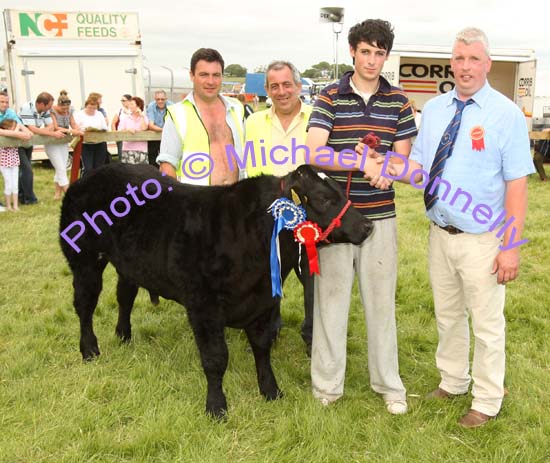 Paul Yorke, Ballymahon Co Longford is congratulated at Roundfort Agricultural Show, by  Alan McRea, Strabane (Judge),  for his Reserve Champion of Show, included in photo are PJ Mooney and Michael Heneghan Show Stewards. Photo:  Michael Donnelly
