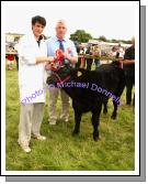 Paul Yorke  Ballymahonn Longford is presented with rosette for Best Male Calf Born 2008 at the Roundfort Agricultural Show by  Owen O'Neill Bova AI Limerick (Judge). Photo Michael Donnelly