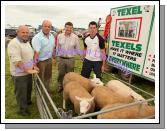 David Coen, Lehinch, Hollymount, (on right), who won the Champion Pedigree Sheep title at Roundfort Agricultural Show, shows his prizewinning pen to from left: Cllr Patsy O'Brien, Liam Coen, and Deputy John O'Mahony. Photo Michael Donnelly