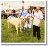 Jim Nally, Chairman Roundfort Agricultural Show presents the Kathleen Nally Memorial Perpetual Cup to April Higgins, Ballindine, in the Roundford Young Stockperson Championship, at Roundfort Agricultural Show, on left is Alan McRea, Strabane (Judge). Photo Michael Donnelly