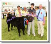 Paul Yorke, Ballymahon Co Longford is congratulated at Roundfort Agricultural Show, by  Alan McRea, Strabane (Judge),  for his Reserve Champion of Show, included in photo are PJ Mooney and Michael Heneghan Show Stewards. Photo:  Michael Donnelly