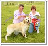 Declan Mangan Cloghans Hill Tuam pictured with his Golden Retriever "Setanta" who won the Champion Dog at Roundfort Agricultural Show is presented with the Thomas Lyons Memorial Cup by Breda O'Malley, Show committee. Photo Michael Donnelly