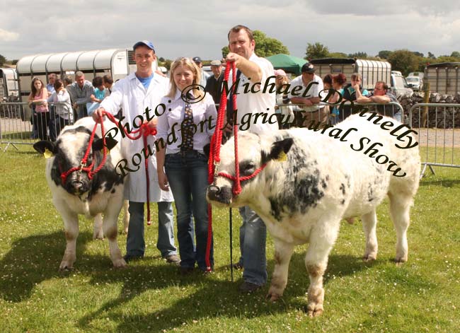 David Pearson, Ballacolla, Laois had 1st and 2nd  in the "Pedigree Belgian Blue Bull calf born on or after 1/9/2008" class at Roundfort Agricultural Show, from left: Sean Moran, Sharon Rothwell (Judge) and David Pearson, Ballacolla, Co Laois. Photo:  Michael Donnelly