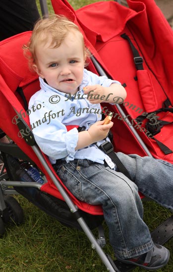 Shay Sweeney, The Neale, enjoying a biscuit at Roundfort Agricultural Show. Photo:  Michael Donnelly