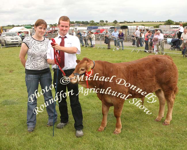 Bridget Nihill, Cloonlara Co Clare and Brian Killeen, Clooonlara pictured with  Best Pedigree Limousin calf  male born on or after 1/1/09 at Roundfort Agricultural Show. Photo:  Michael Donnelly
                   