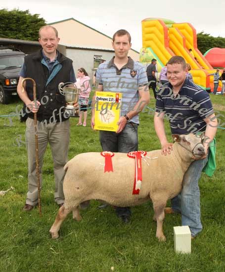 Niall Forde, Castleblakeney, Ballinasloe (on right)  with his Pedigree Champion Sheep of Roundfort Agricultural Show included in photo are Eamon Walsh, Ballina, Sheep Judge and Andrew Glynn, Bimeda sponsor.Photo:  Michael Donnelly