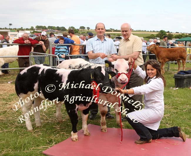 Claire O'Brien Burnfoot, Co Donegal, pictured with "Best pair of Continental Cross Calves" at Roundfort Agricultural Show, at back  Jim Nally, Chairman Roundfort show (on left) is presented with sponsorship for the class by Tom Duffy, Mayo Mats Belmullet - cowmat included in photo. Photo:  Michael Donnelly