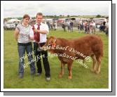 Bridget Nihill, Cloonlara Co Clare and Brian Killeen, Clooonlara pictured with  Best Pedigree Limousin calf  male born on or after 1/1/09 at Roundfort Agricultural Show. Photo:  Michael Donnelly
                   