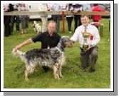 Seamus Fallon, Tuam pictured with his English Setter "Darcy" winner of the Best Pedigree Dog, is presented with the Anne  Fahy Ronayne Cup by Dr Gerard Fleming, Galway (Judge) at Roundfort Agricultural Show.Photo:  Michael Donnelly