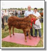 Cathal O'Meara, Ardnacrusha, Co Clare  on right pictured with his champion Interbreed Heifer pictured with Jim Nally, Chairman Roundfort Agricultural Show at Roundfort Agricultural Show. Photo:  Michael Donnelly