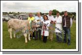 Sean O'Brien, Burnfoot, Donegal owner of the winning heifer in the 1100 Euro All Ireland  Heifer championship sponsored by Roundfort Stores and Connacht Gold at Roundfort Agricultural Show is presented with cheque by Joe Waldron Connacht  Gold, included in photo from left: Padraig Heneghan, Committee; Jim Nally, Chairman Roundfort Agricultural Show; Clare O'Brien, Burnfoot, Joe Waldron, Connacht Gold; Sean O'Brien, Burnfoot and Gordon Cutler, Enniskillen (Cattle Judge). Photo:  Michael Donnelly