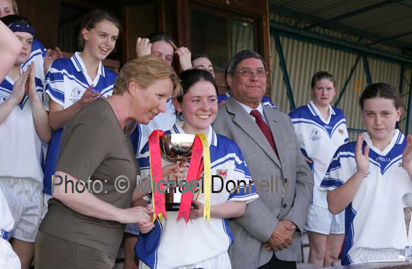 Geraldine Giles Uachtaran Cumann Peil Gael na mBan presents the cup to Aoife Conroy captain St Josephs Castlebar who defeated Ard Scoil na nDise Dungarvan in the Cumann Peil Gael na mBan Pat the Baker Post Primary Schools All Ireland Senior Final 2007 in Cusack Park Ennis. Photo:  Michael Donnelly