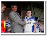 Kathryn Sullivan St Josephs Secondary School Castlebar is presented with the Player of the match award  by Graham Fester, (Depot manager Pat The Baker Kilkenny)  Cumann Peil Gael na mBan Pat the Baker Post Primary Schools All Ireland Senior Final 2007 in Cusack Park Ennis. Photo:  Michael Donnelly