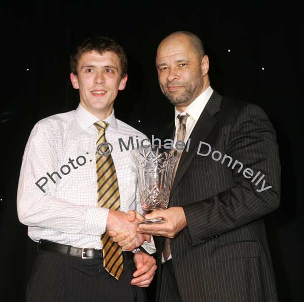 John Byrne, Straide is presented with the Athletics award by Guest of Honour Paul McGrath at the Western People Mayo Sports Awards 2006 presentation in the TF Royal Theatre Castlebar. Photo:  Michael Donnelly