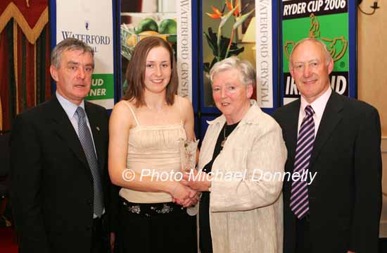 Gemma Hynes Galway City Harriers AC is presented with her award at the Waterford Crystal A.A.I,  Juvenile Star Awards in the Belmont Hotel, Knock Co Mayo by  Breda Synott chairperson National Juvenile Committee AAI, included in photo are Patsy McGonagle Vice-president AAI and Michael Gaffney Waterford Crystal (sponsors). Photo Michael Donnelly

