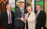 Caoln Flanagan Ballymena /Antrim AC is presented with his award at the Waterford Crystal A.A.I, Juvenile Star Awards in the Belmont Hotel, Knock Co Mayo by  Breda Synott chairperson National Juvenile Committee AAI, included in photo are Michael Gaffney Waterford Crystal (sponsors), and  Patsy McGonagle Vice-president AAI and Photo Michael Donnelly