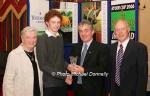 Simon Heron, Derry (St Columb;s College AC), is presented with his award at the Waterford Crystal A.A.I,  Juvenile Star Awards in the Belmont Hotel, Knock by  Patsy McGonagle Vice-president AAI included in photo are and Breda Synott chairperson National Juvenile Committee AAI. and Michael Gaffney, Waterford Crystal (sponsor)., Photo Michael Donnelly