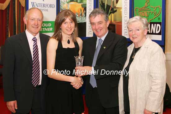 Rose Ann Gilligan Newbridge AC is presented with her award at the Waterford Crystal A.A.I,  Juvenile Star Awards in the Belmont Hotel, Knock Co Mayo by  Patsy McGonagle Vice-president AAI, included in photo are and Michael Gaffney Waterford Crystal (sponsors) and Breda Synott chairperson National Juvenile Committee AAI. Photo Michael Donnelly.