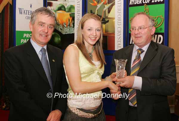 Michael OHart presents the Keara OHart award (for Sprinting) to Louise Kiernan,  Swords (Fingallians) at the Waterford Crystal Athletic Association of Ireland, Juvenile Star Awards in the Belmont Hotel, Knock, Co Mayo included in photo is Patsy McGonagle Vice-president AAI Photo Michael Donnelly