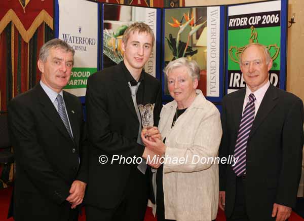 Stephen Darcy Bagenalstown  is presented with the Bill  Battersby Award (for Long Jump) at the Waterford Crystal A.A.I,  Juvenile Star Awards in the Belmont Hotel, Knock by  Brenda Synott chairperson National Juvenile Committee AAI, included in photo are Patsy McGonagle Vice-president AAI and Michael Gaffney, Waterford Crystal (sponsor). Photo Michael Donnelly

