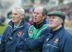 Tommy Lyons and management watch the game. Photo Michael Donnelly
