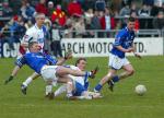 Liam Brady and Eanna Casey (on the ground) in action for Ballina. Photo Michael Donnelly