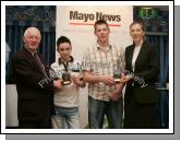 Juvenile Male Track and Field Winners were Westport AC team-mates, Cian McManamon and Laimonas Ruibys, who shared the award and received them from Ernie Deacy, Chairman Mayo Athletics Board, and Denise Horan, Editor of The Mayo News. Photo:  Michael Donnelly