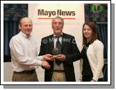 Gerry Kilroy, Westport AC accepted the Overall Club of the Year Award from Padraic Walsh, Treasurer Mayo Athletics Board, and Sinead O'Malley of the Mayo News at the Mayo News Mayo Athletic Awards, in Hotel Westport. Photo:  Michael Donnelly