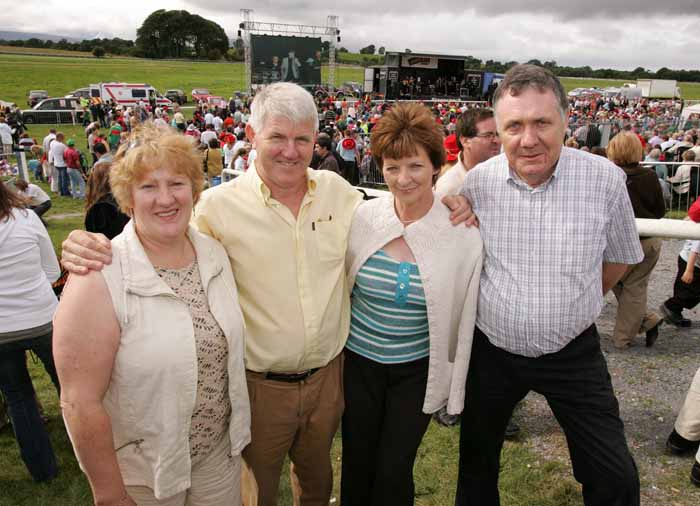 Tommy and Christina Cox, Castlebar and  Mary and Aiden McGovern Birmingham, pictured at "Craic on the Track" at Ballinrobe Racecourse on Sunday where Mayo football supporters watched the Mayo v Laois game in Croke Park live on the Big Screens. Photo:  Michael Donnelly