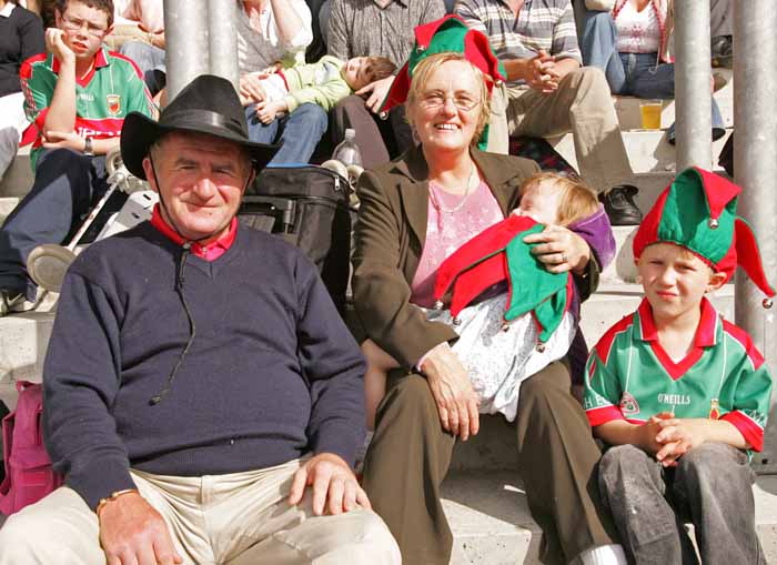 Brendan and Mary Cresham Castlebar, pictured  with teir grandchildren Mary Ann and Callum Cresham, at "Craic on the Track" at Ballinrobe Racecourse on Sunday where Mayo football supporters watched the Mayo v Laois game in Croke Park live on the Big Screens. Photo:  Michael Donnelly