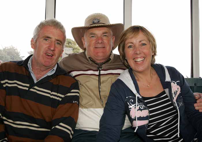 Jimmy Byrne, Terry Cawley, and Maureen Byrne pictured at "Craic on the Track" at Ballinrobe Racecourse on Sunday where Mayo football supporters watched the Mayo v Laois game in Croke Park live on the Big Screens. Photo:  Michael Donnelly