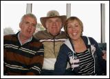 Jimmy Byrne, Terry Cawley, and Maureen Byrne pictured at "Craic on the Track" at Ballinrobe Racecourse on Sunday where Mayo football supporters watched the Mayo v Laois game in Croke Park live on the Big Screens. Photo:  Michael Donnelly