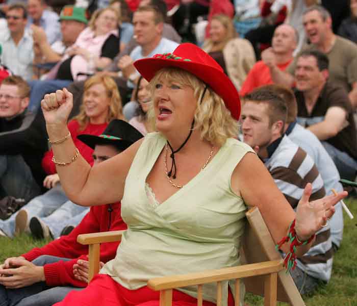 Mary Maguire Claremorris watches an anxious moment in the Mayo v Laois game on the Big Screen at the "Craic on the Track" at Ballinrobe Racecourse.  Photo: Michael Donnelly.