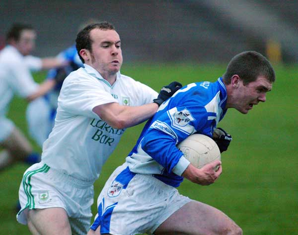 Breaffy is closely watched by Ballaghaderreen  defenders in the Breaffy House and Spa  County Intermediate Football Championship Final in McHale Park Castlebar. Photo: Michael Donnelly
