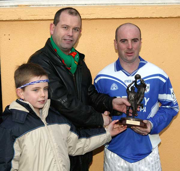 Conor and Mark Deegan (Chef Breaffy House Hotel) presents the Man of the Match award to Konrad Coghill  in the Breaffy House and Spa  County Intermediate  Football Championship Final in McHale Park Castlebar. Photo: Michael Donnelly