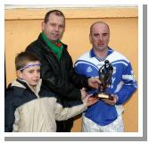 Conor and Mark Deegan (Chef Breaffy House Hotel) presents the Man of the Match award to Konrad Coghill  in the Breaffy House and Spa  County Intermediate  Football Championship Final in McHale Park Castlebar. Photo: Michael Donnelly