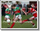 Claire Egan, Carnacon chased Catriona McConnell Donaghmoyne in the Vhi Healthcare All-Ireland Ladies Senior Club Championship Final, Carnacon v Donaghmoyne, Pairc Na nGael, Dromard, Co Longford. Photo:  Michael Donnelly