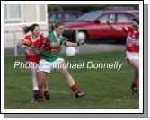 Cora Staunton, Carnacon is closely marked by plaayers from Donaghmoyne (Monaghan) in the VHI Healthcare All Ireland Ladies Club Championship Senior Final 2006 at Dromard Co Longford. Photo:  Michael Donnelly